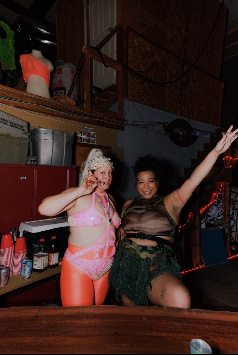 Behind the bar, mid-celebration