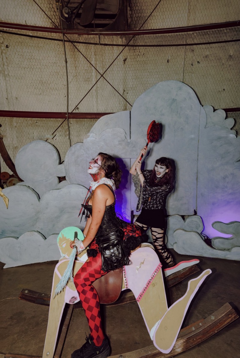 The clowns getting theatrical on the rocking horse set