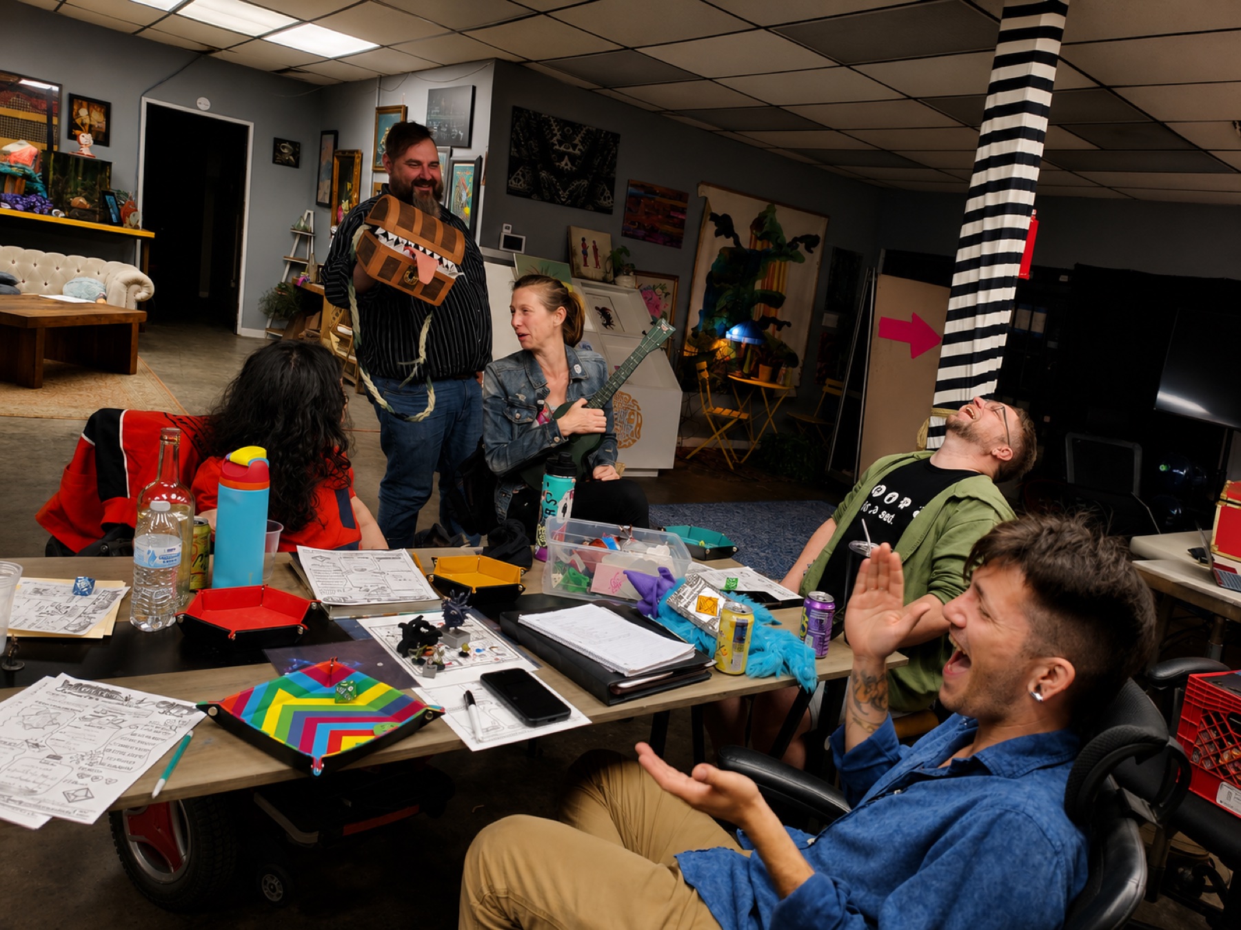 Game Night · the D&D table cracking up, mimic chest and ukulele included